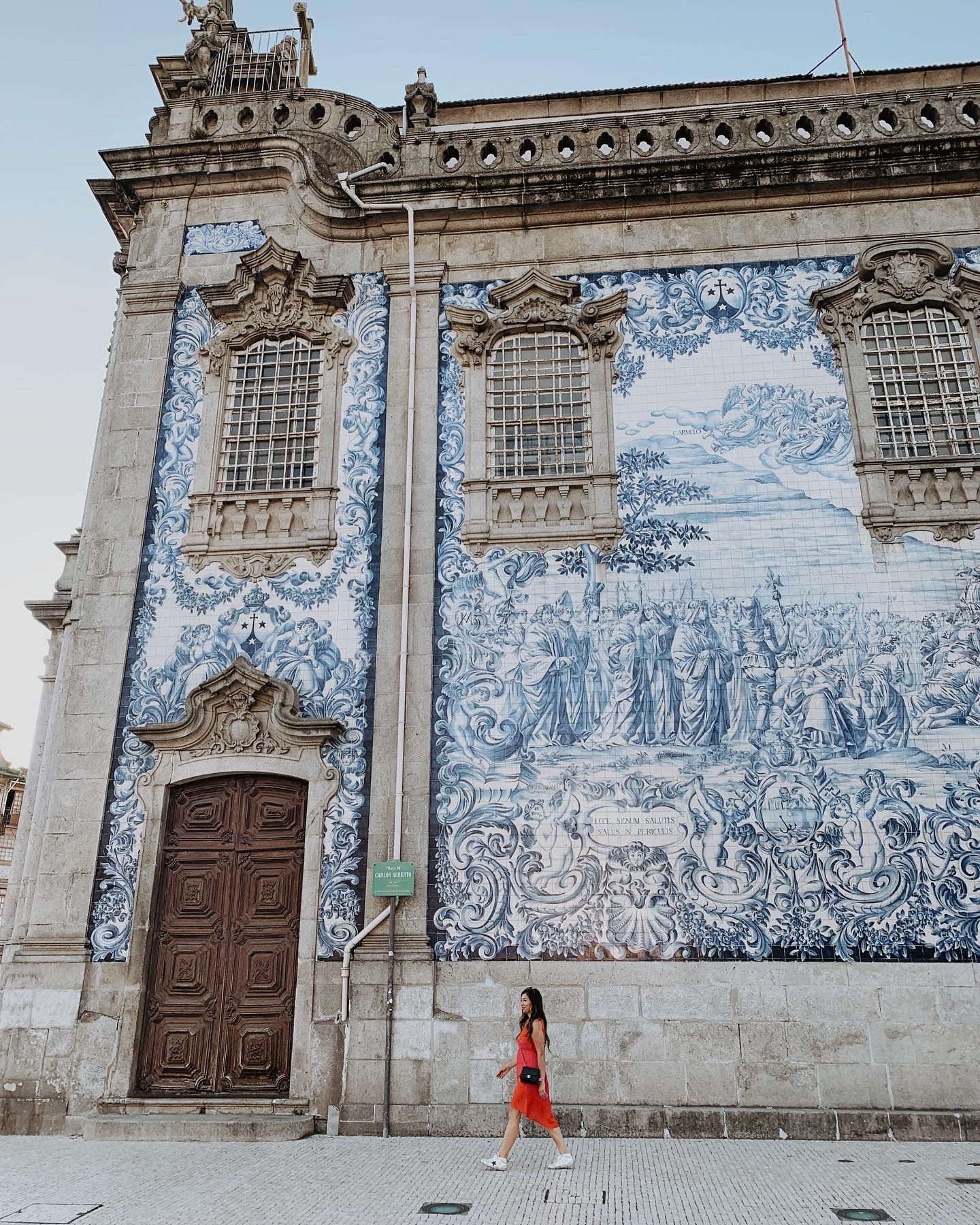 Betty at a tiled church in Porto, Portugal