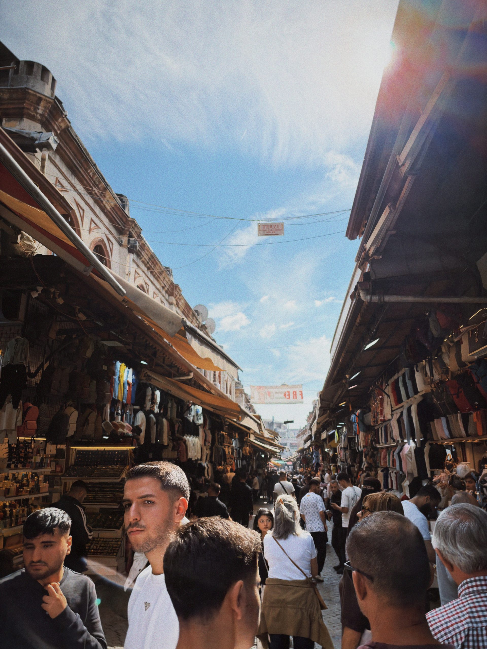 Busy covered shopping lane inside Istanbul's Grand Bazaar