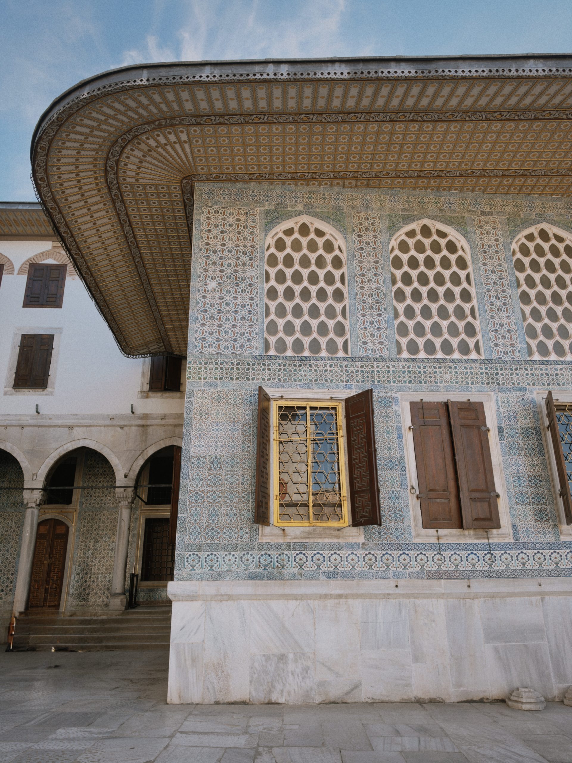 Ornate tiled facade and windows on a historic building in Istanbul