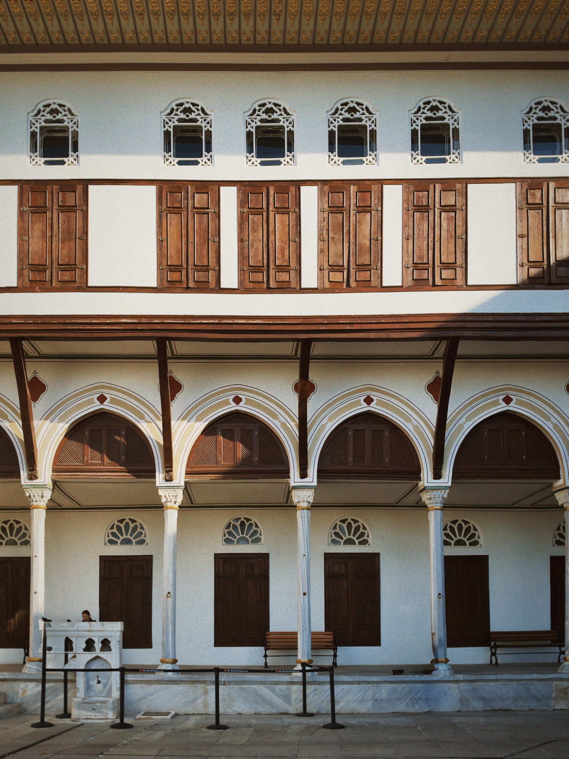 Arches and windows surrounding a courtyard at an Ottoman palace in Istanbul